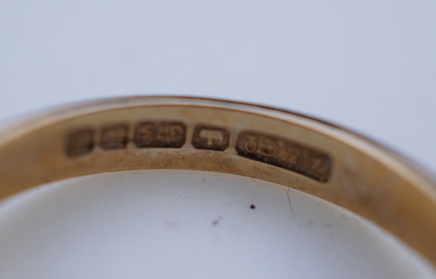 Four gem-set rings